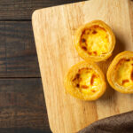 egg tart on wooden background.